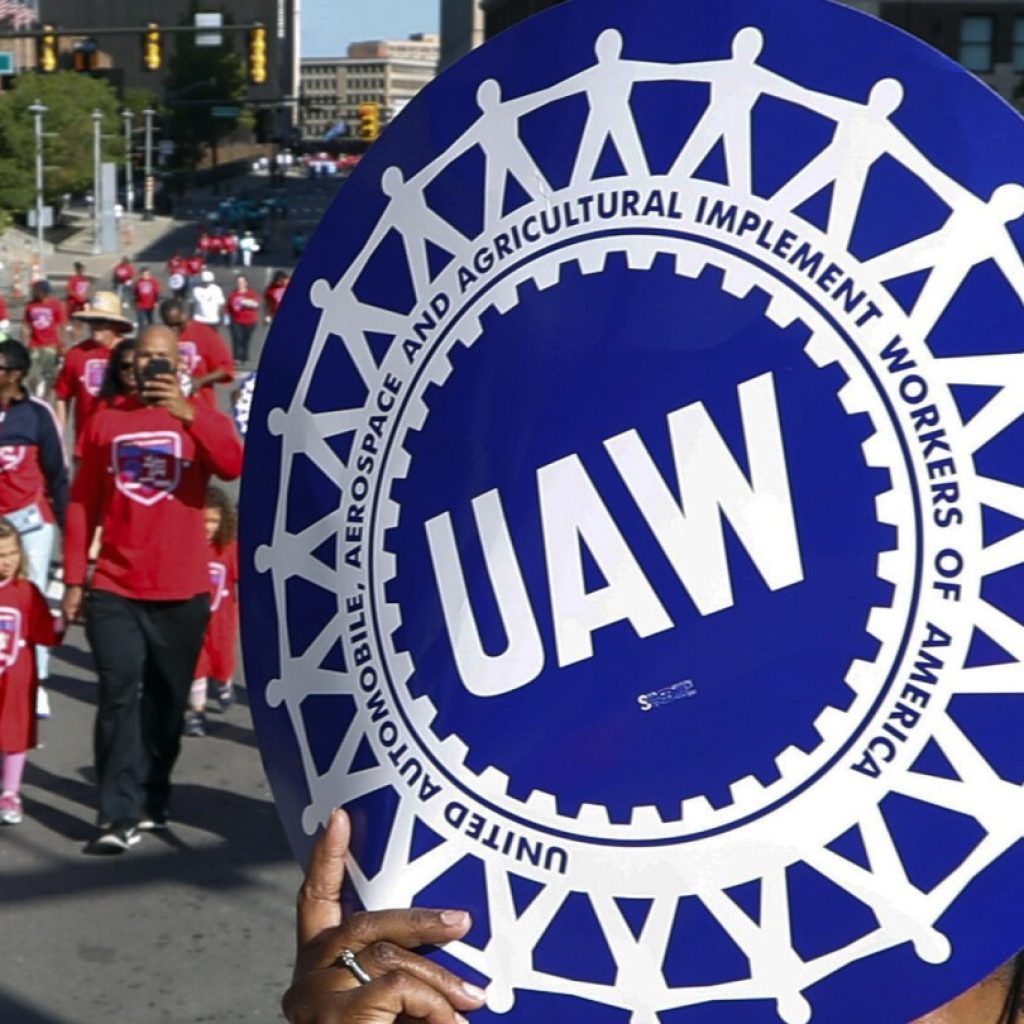 UAW vote on tentative contract with GM is too close to call | AP News