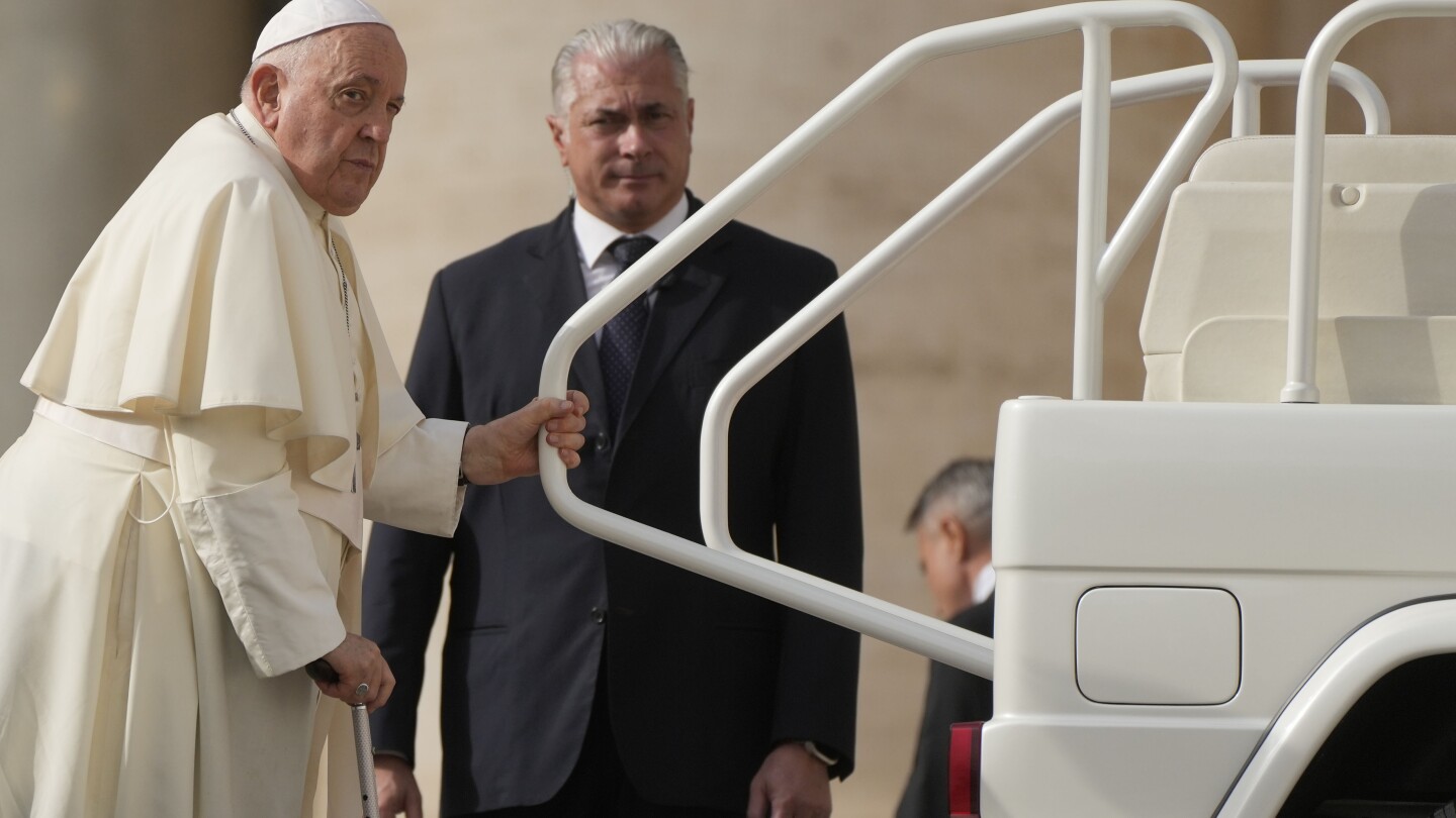 Vatican plans to gradually replace car fleet with electric vehicles in deal with VW | AP News