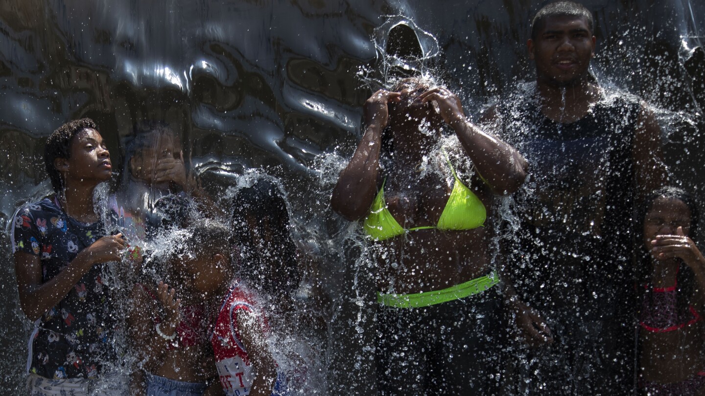 It’s not yet summer in Brazil, but a dangerous heat wave is sweeping the country | AP News