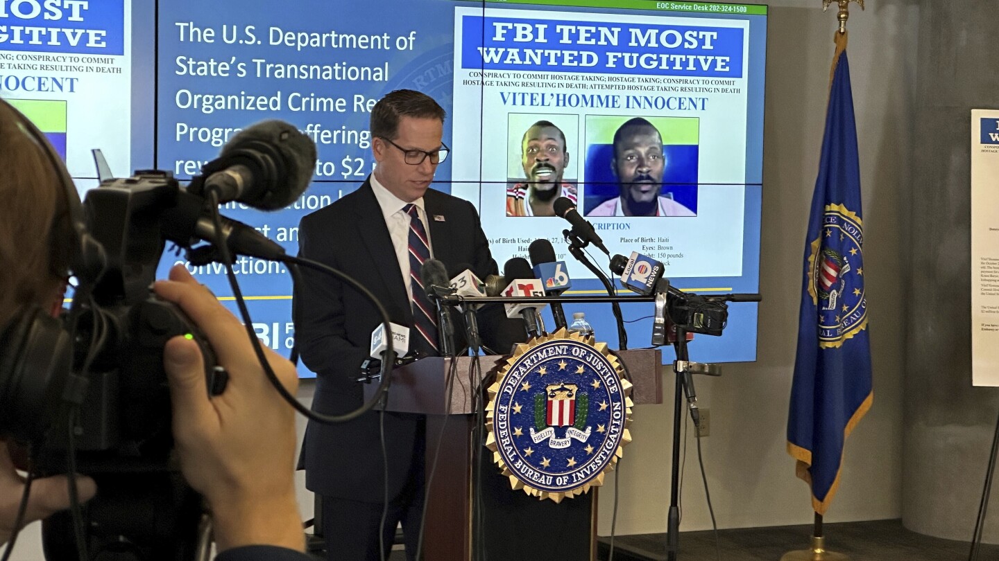 FBI Most Wanted: Haitian gang leader  Vitel’Homme added to list | AP News