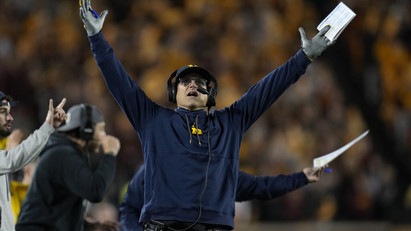 Jim Harbaugh to serve suspension as Michigan investigation closes | AP News