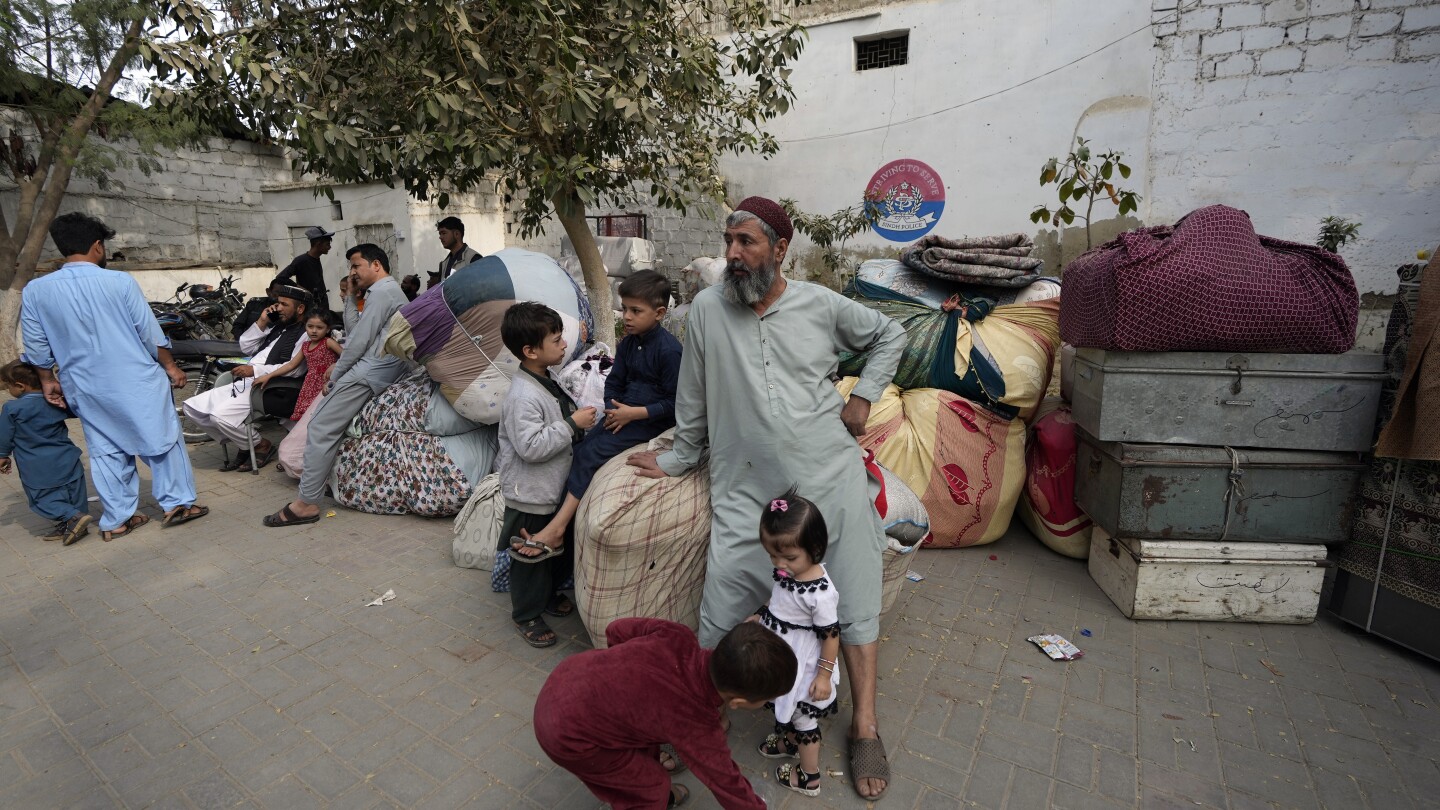 More than a million Afghans will go back after Pakistan begins expelling foreigners without papers | AP News