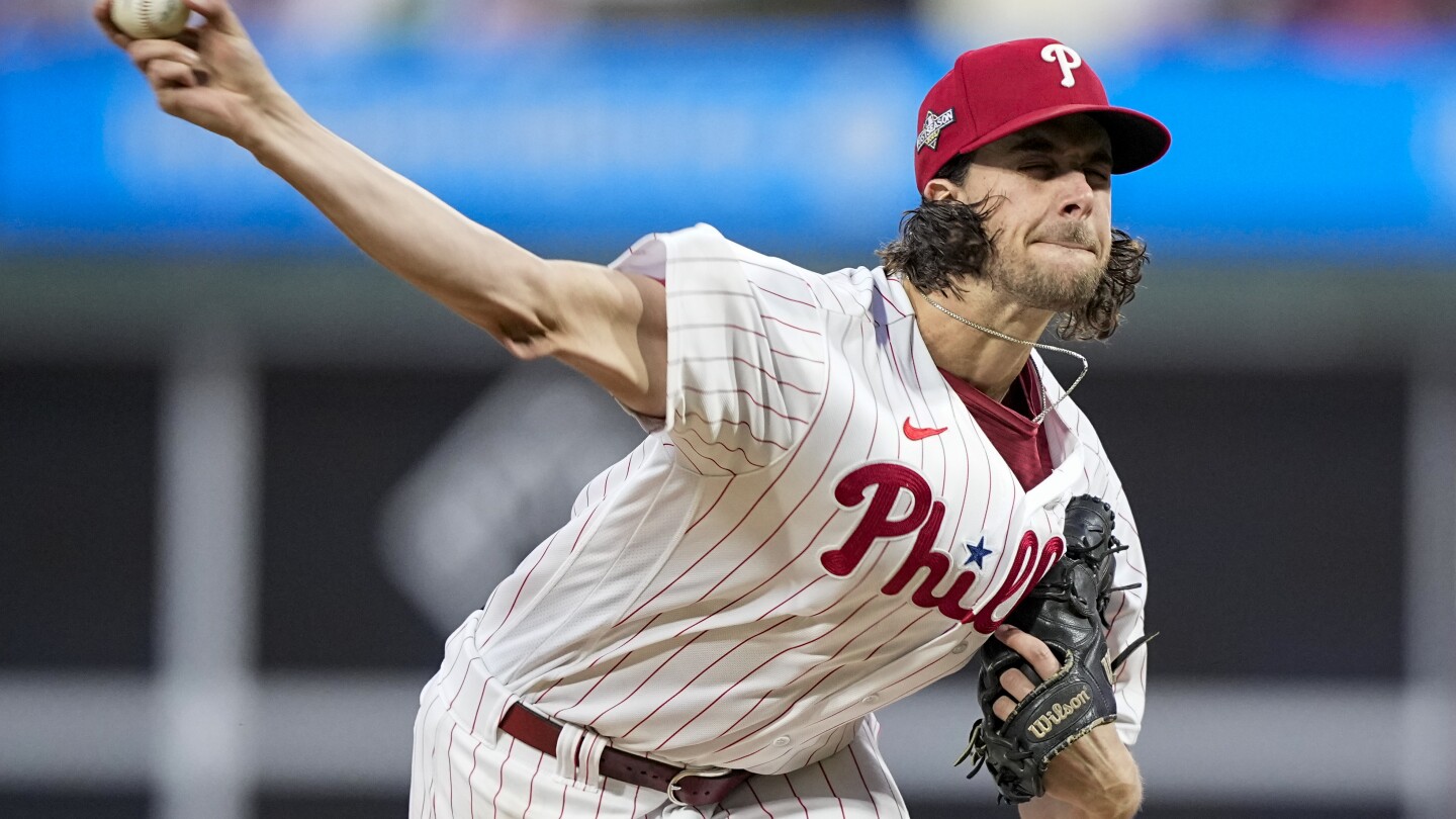 Aaron Nola is staying in Philadelphia, signing a 7-year deal with the Phillies | AP News