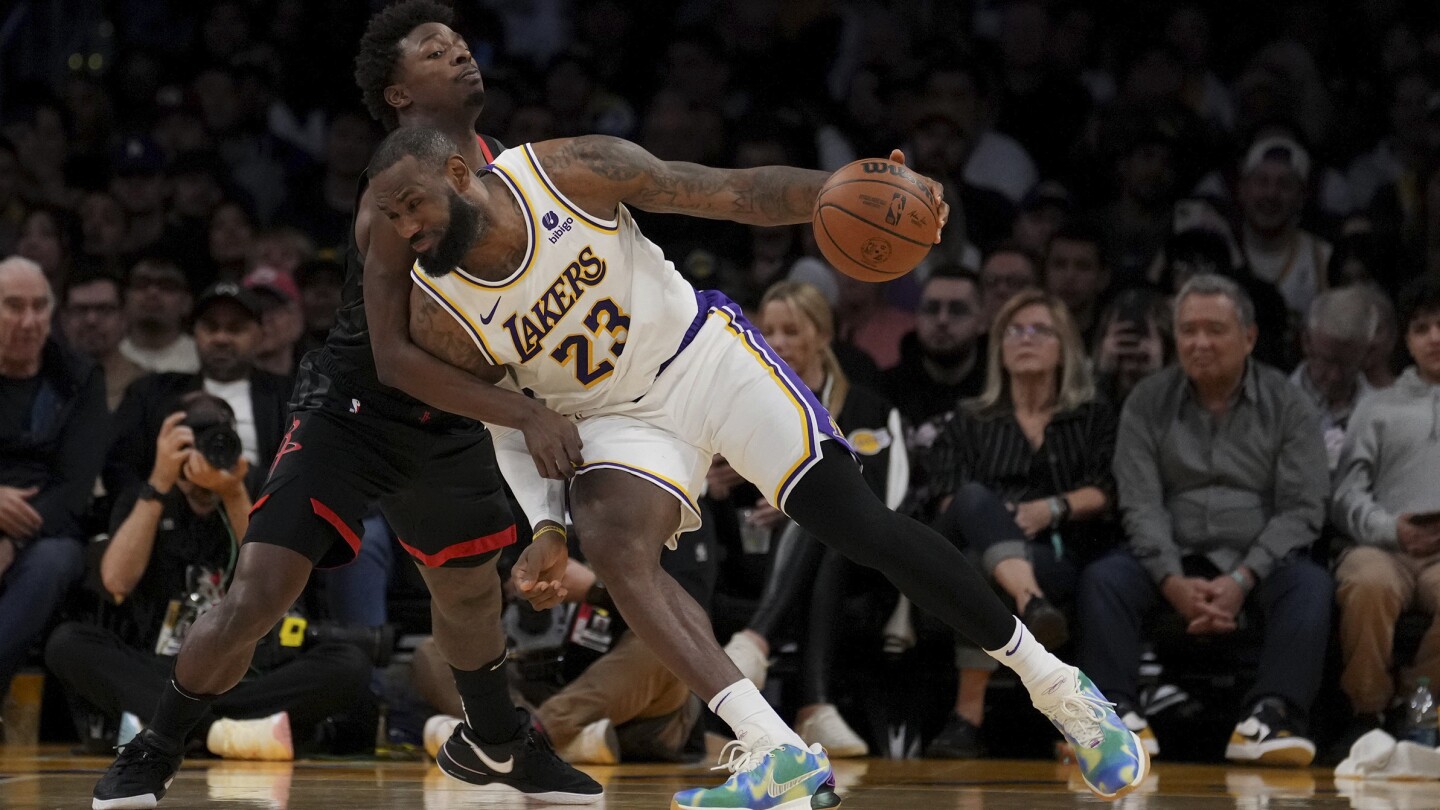 James scores season-high 37, hits go-ahead free throw as Lakers hold off Rockets 105-104 | AP News