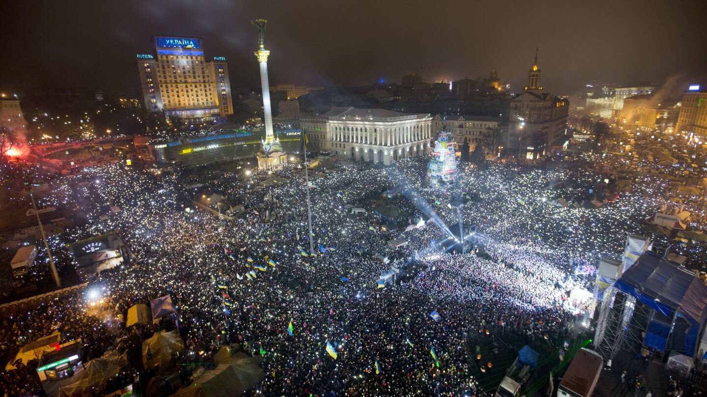 Ukraine reflects on events that began its collision course with Russia 10 years ago | AP News