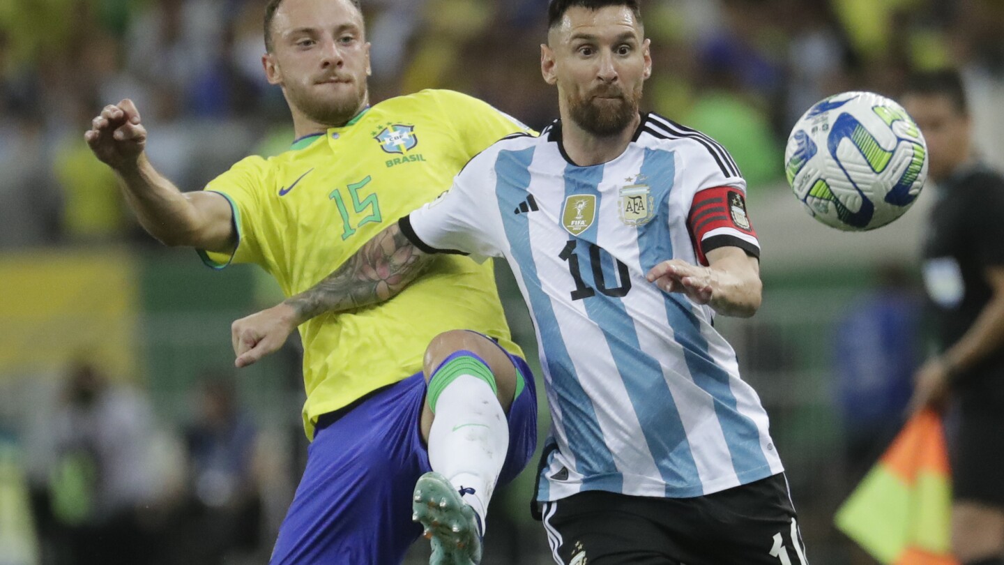 Messi’s Argentina beats Brazil in a World Cup qualifying game delayed by crowd violence | AP News