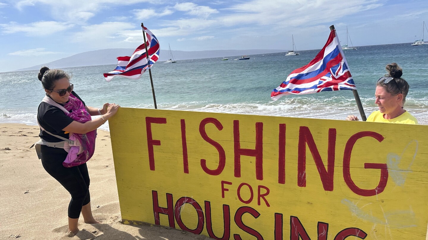 Maui wildfire survivors camp on the beach to push mayor to convert vacation rentals into housing | AP News