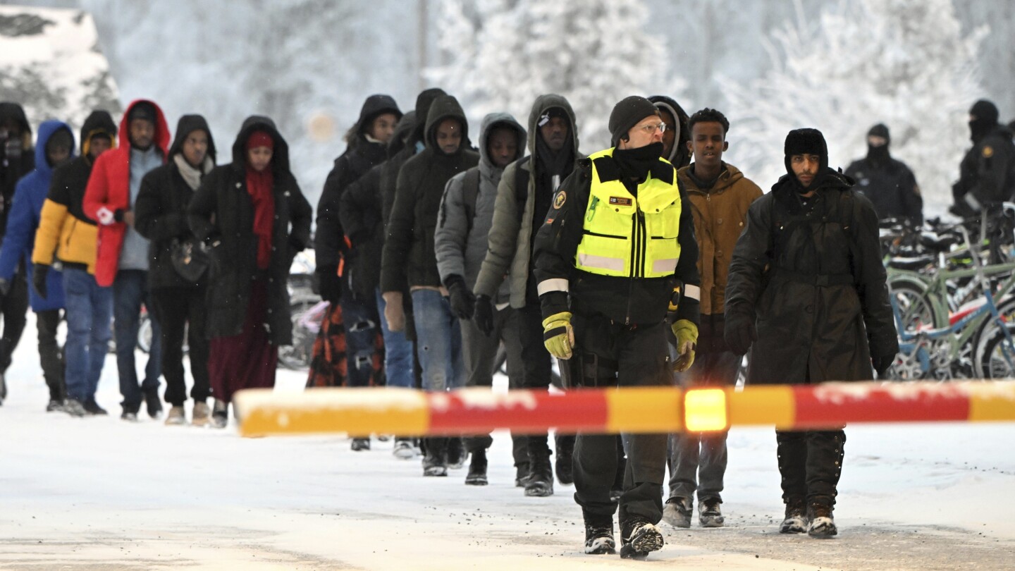 EU sends border police reinforcements to Finland over fears that Russia is behind a migrant influx | AP News