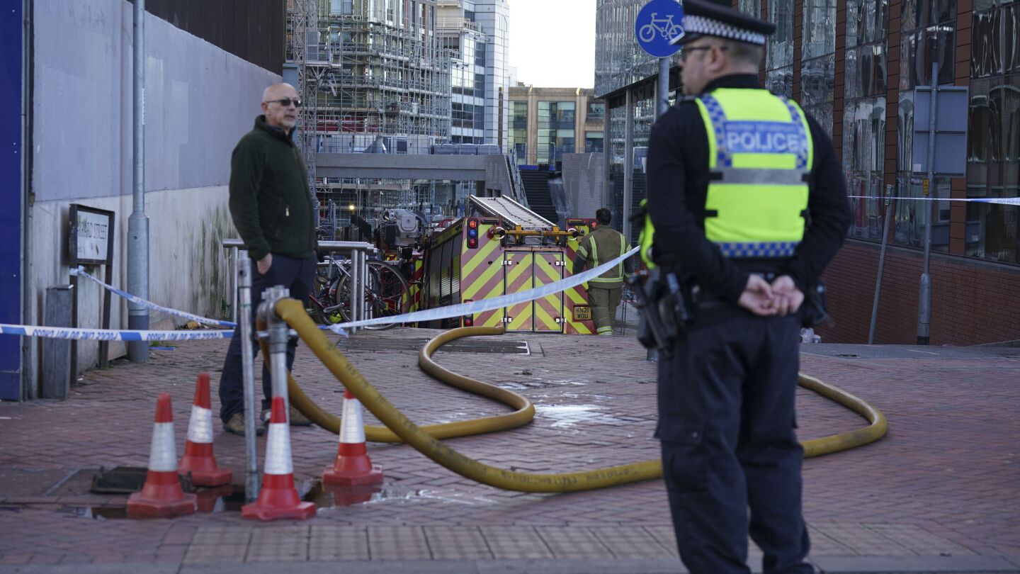 A crane operator has rescued a man from a burning high-rise in England | AP News