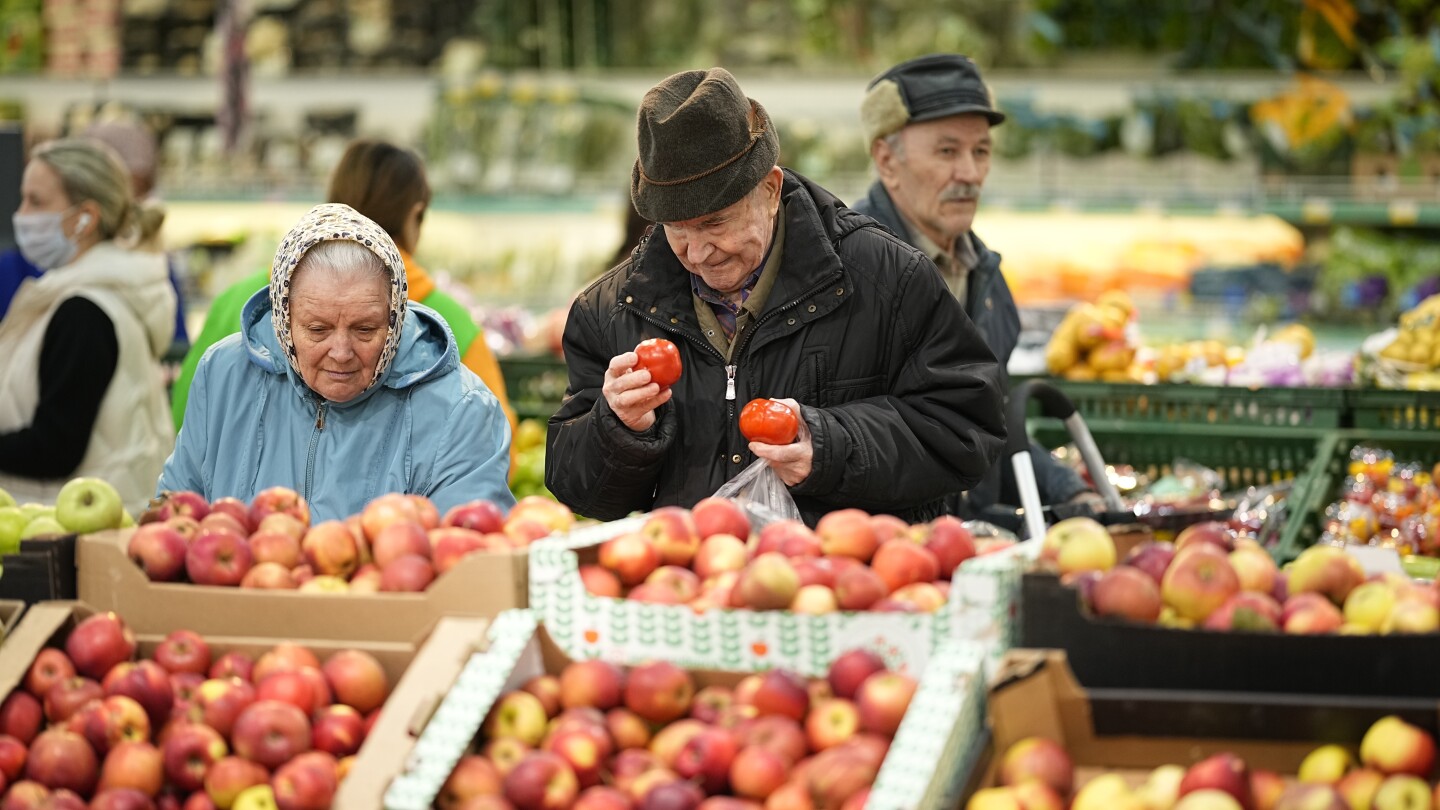 Russian consumers feel themselves in a tight spot as high inflation persists | AP News