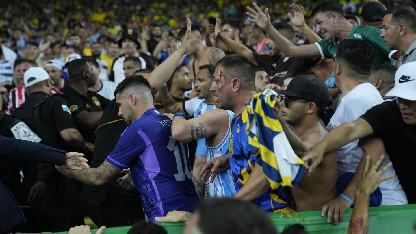 Argentina and Brazil charged by FIFA after fan violence delays World Cup qualifying game at Maracana | AP News