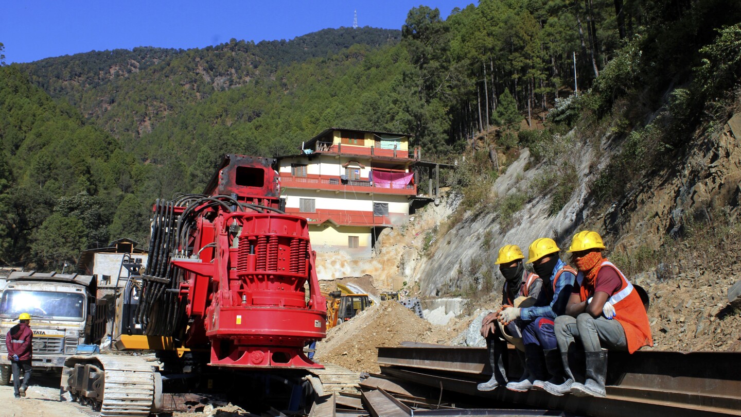 India tunnel collapse: Rescue works halt after machine breaks  | AP News