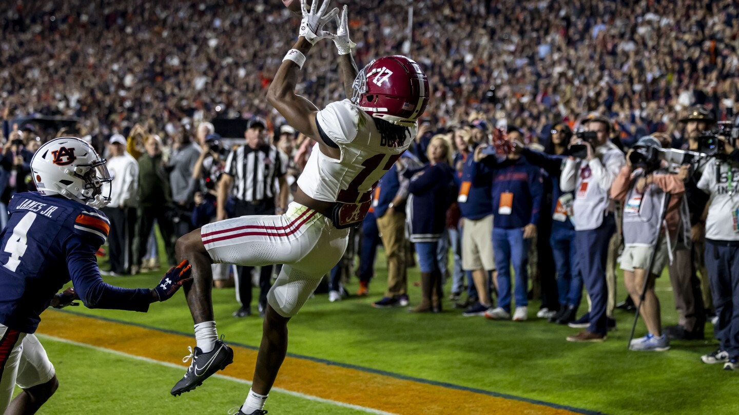 Milroe’s TD pass to Bond on fourth-and-31 rescues No. 8 Alabama in 27-24 win over Auburn | AP News