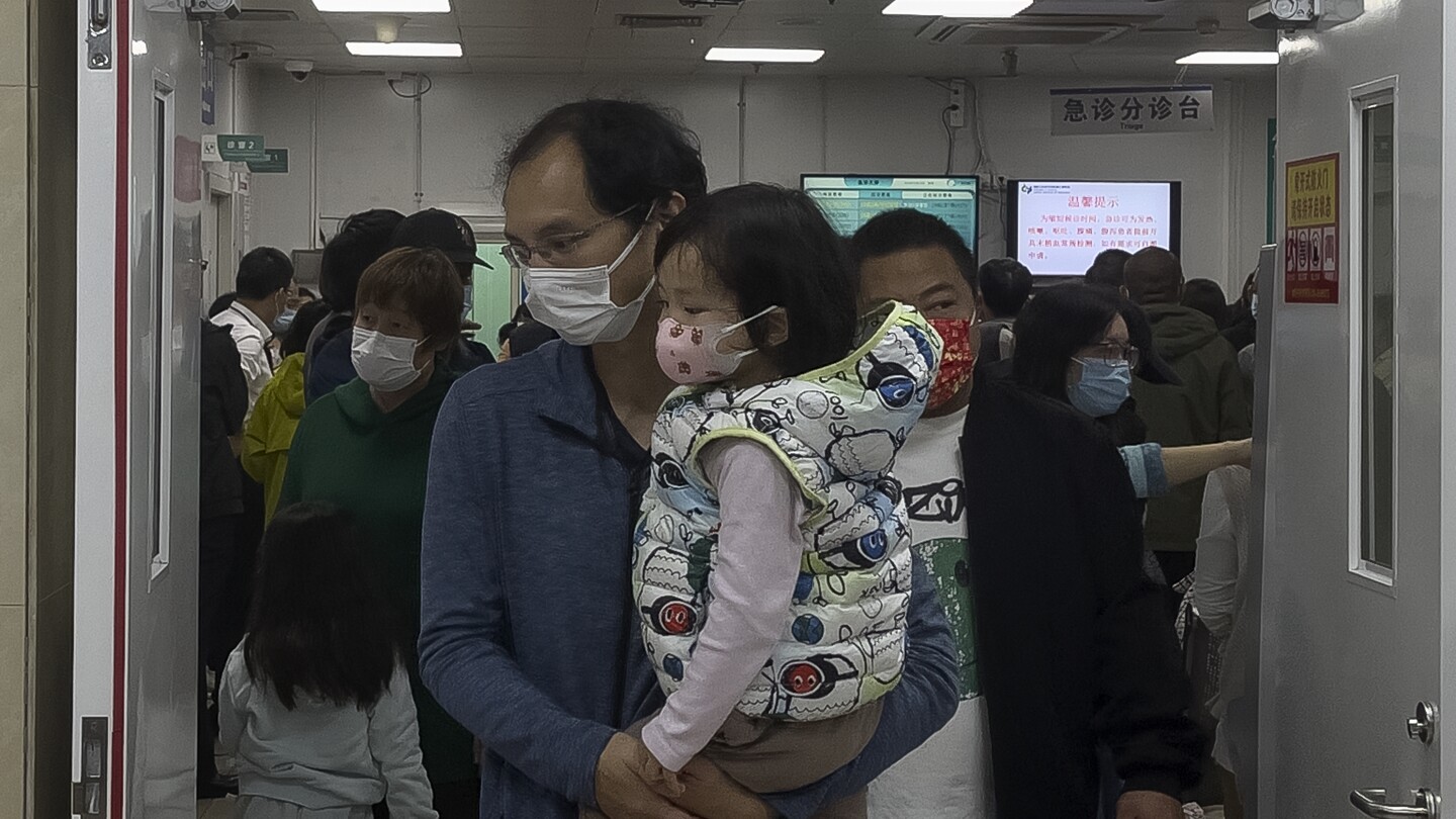 China says a surge in respiratory illnesses is caused by flu and other known pathogens | AP News