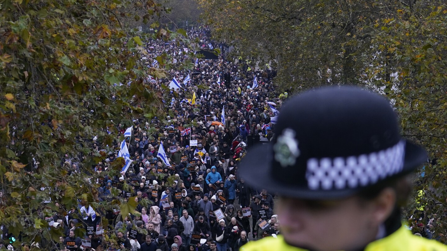 Former UK leader Boris Johnson joins thousands marching against antisemitism in London | AP News