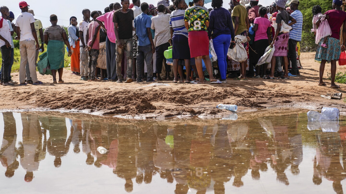 Kenya raises alarm as flooding death toll rises to 76, with thousands marooned by worsening rains | AP News