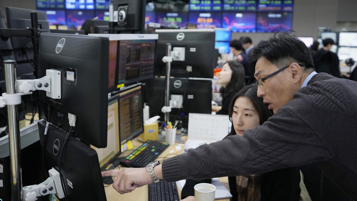 Stock market today: Asian shares mixed ahead of US consumer confidence and price data | AP News