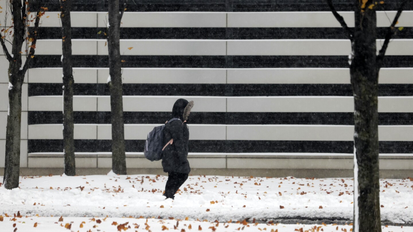 Storm closes schools in Cleveland, brings lake-effect snow into Pennsylvania and New York | AP News