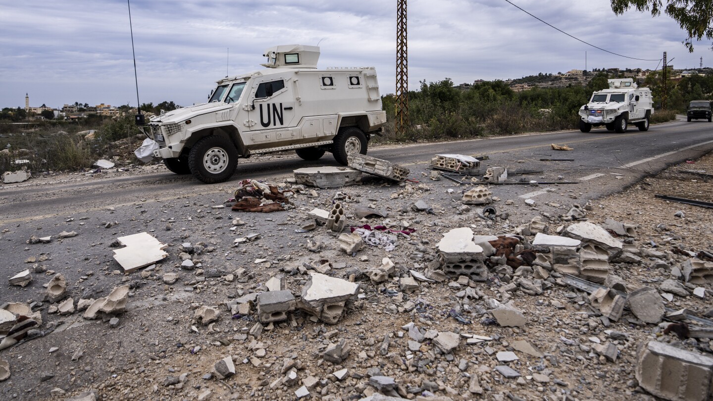 Hezbollah and Israeli troops exchange fire along the border as 2 people are killed in Lebanon | AP News