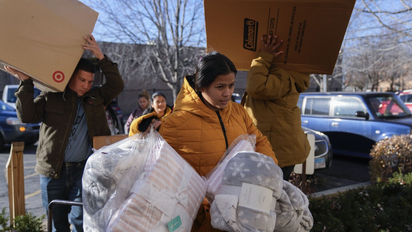 Chicago and other northern US cities scramble to house migrants with coldest weather just ahead | AP News