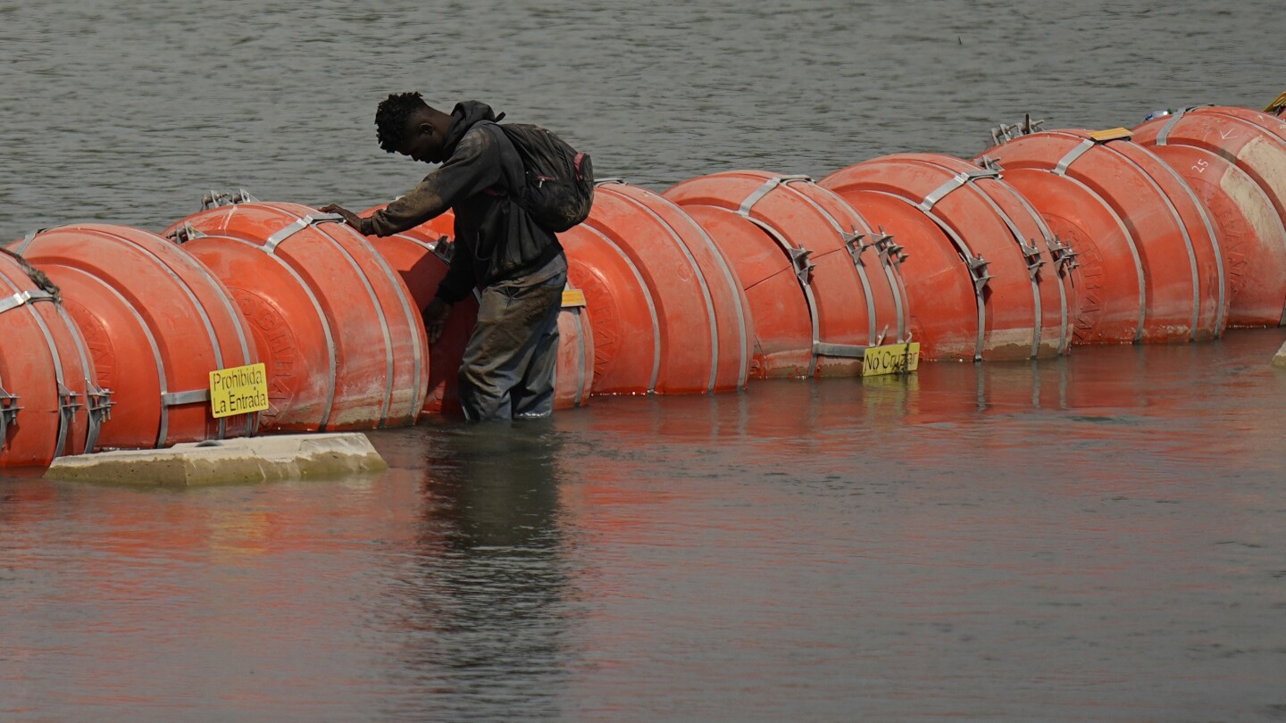 Court orders Texas to move floating buoy barrier that drew backlash from Mexico | AP News