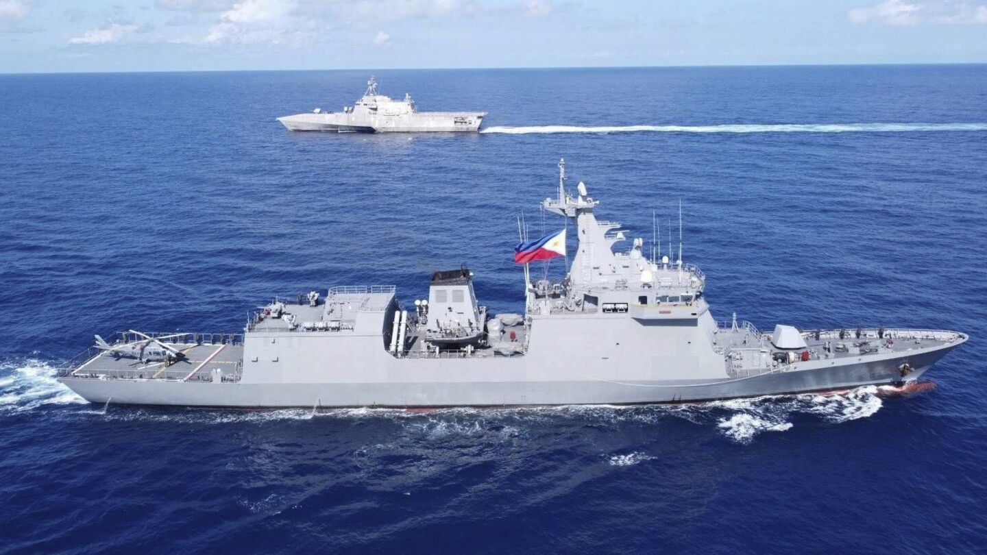 China says a US Navy ship ‘illegally intruded’ into waters in the South China Sea | AP News