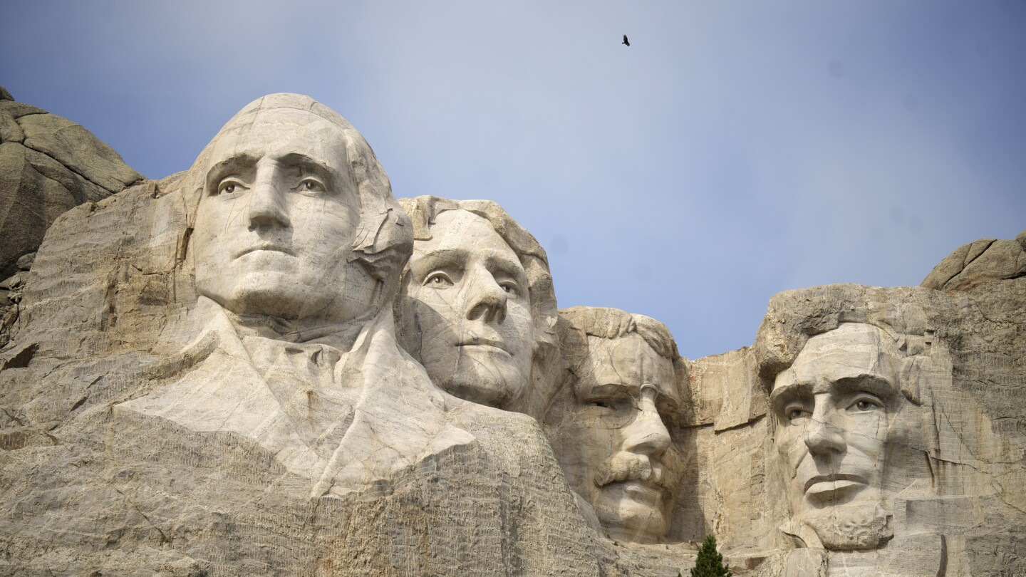 Pilots flying tourists over national parks face new rules. None are stricter than at Mount Rushmore | AP News