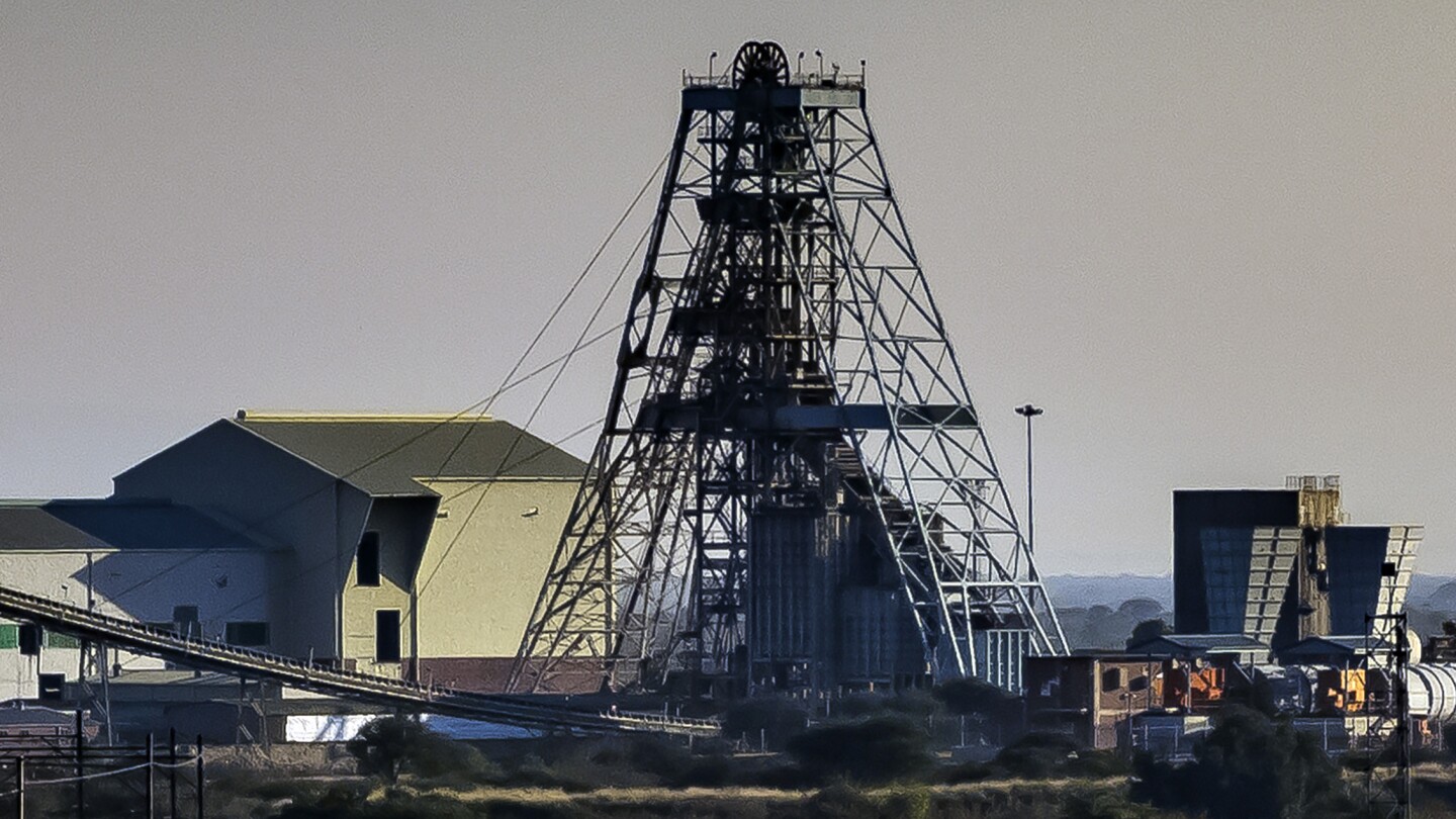 The death toll from a mining tragedy in South Africa rises to 13 after a worker dies at a hospital | AP News