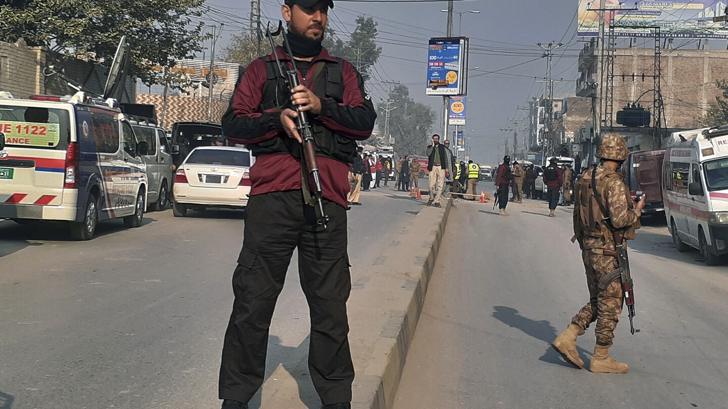 A roadside bombing in the commercial center of Pakistan’s Peshawar city wounds at least 3 people | AP News