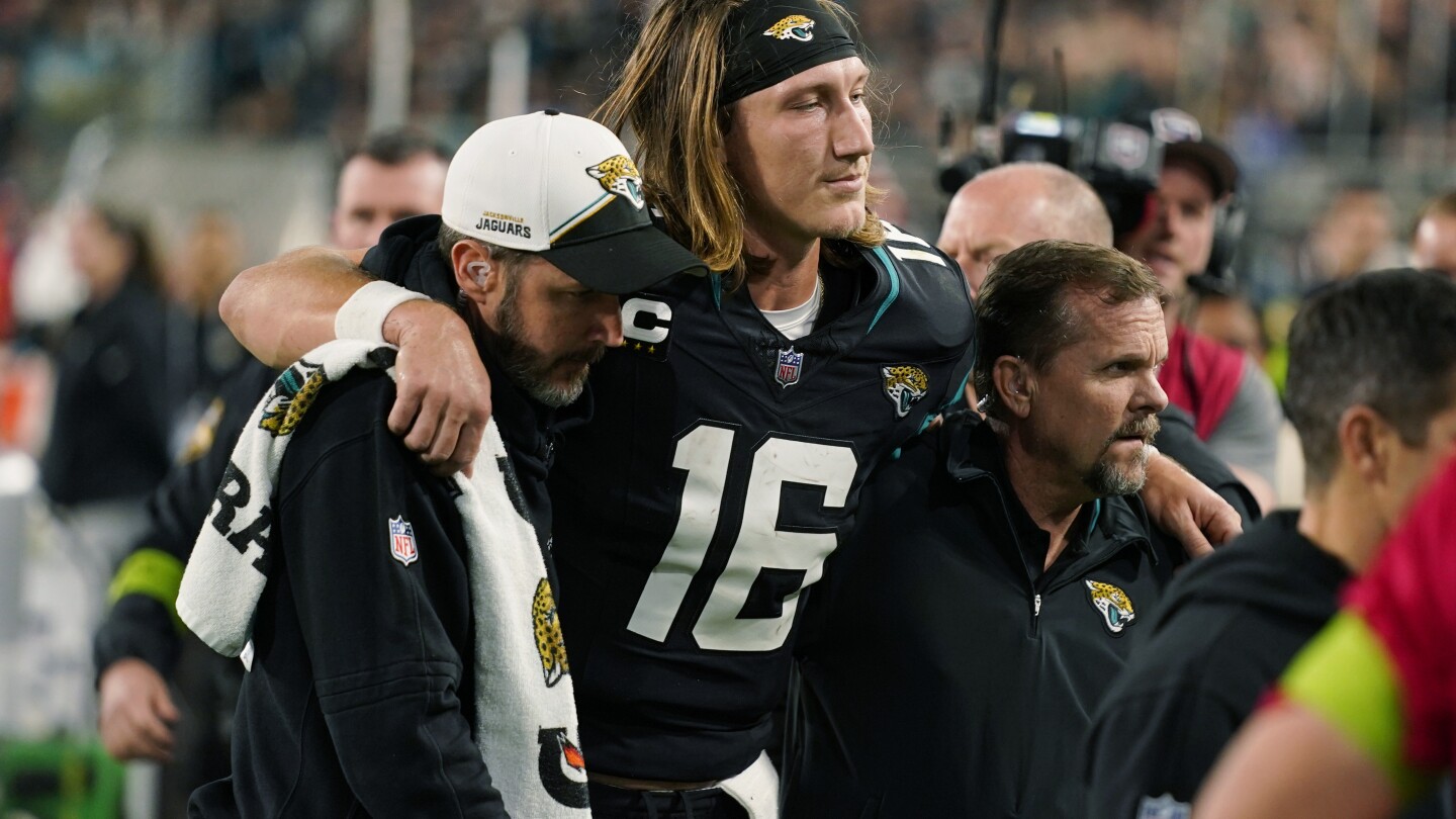 Jaguars QB Trevor Lawrence sprains right ankle in 34-31 overtime loss to Bengals on MNF | AP News