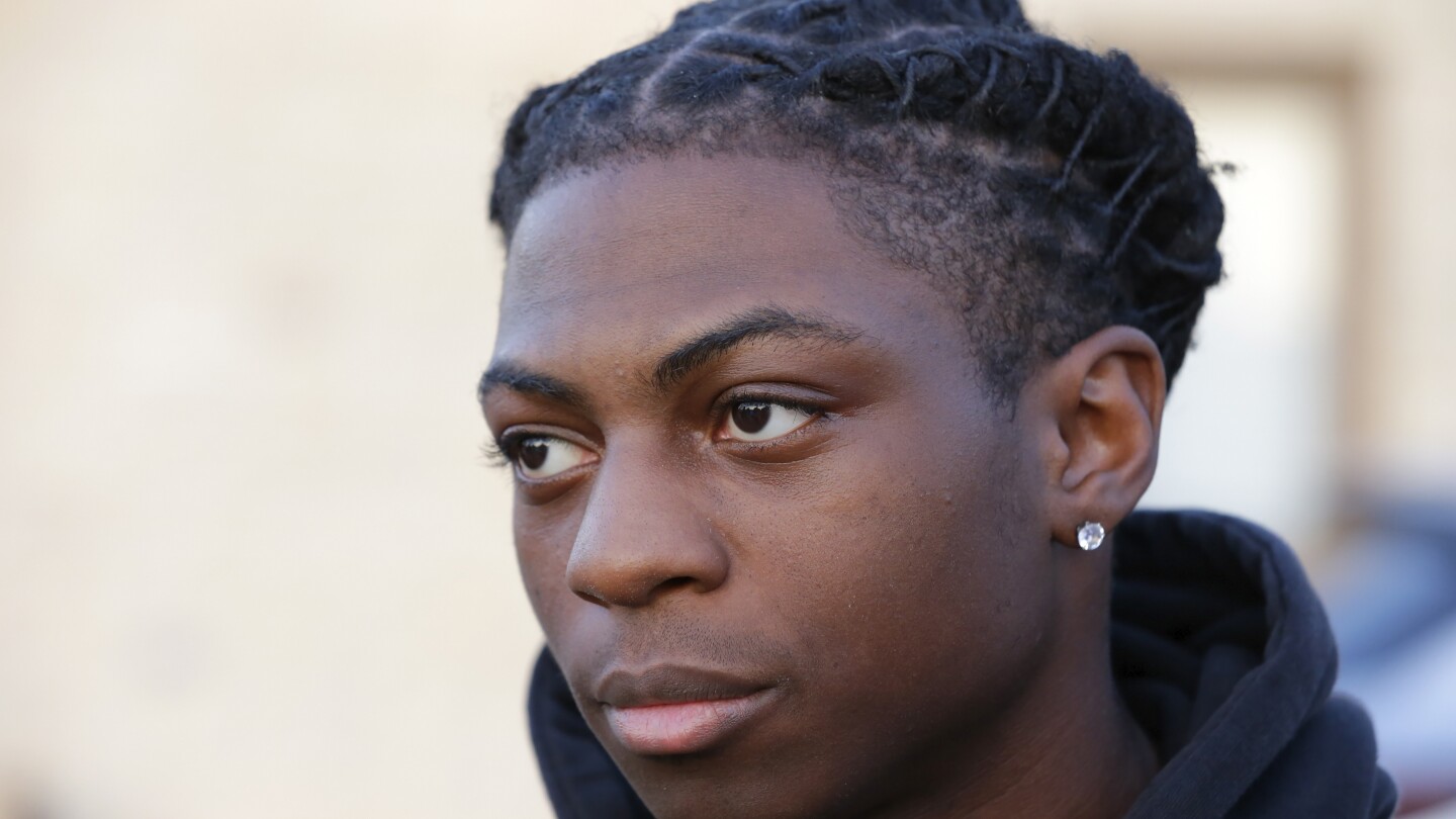 Texas high school sends Black student back to in-school suspension over his locs hairstyle | AP News