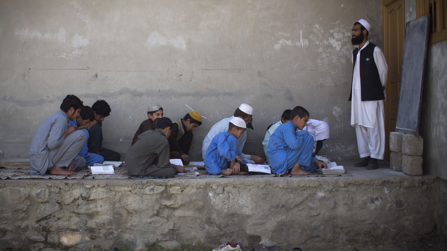 Taliban’s education policy harming boys and girls in Afghanistan, report say  | AP News