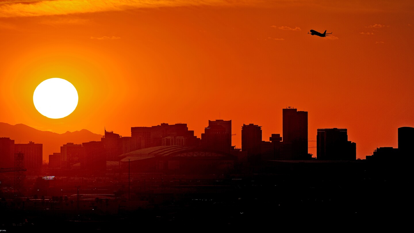 November sets heat record for sixth straight month  | AP News