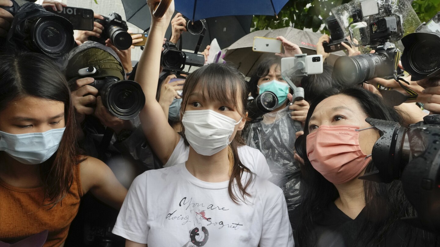 Democracy activist Agnes Chow says she still feels under the Hong Kong police’s watch in Canada | AP News