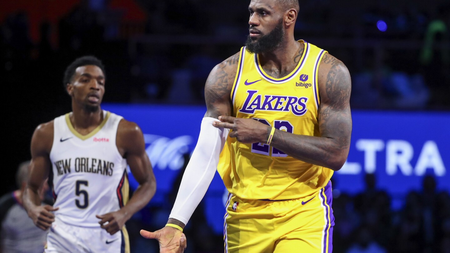 LeBron James scores 30 points, Lakers rout Pelicans 133-89 to reach tournament final | AP News