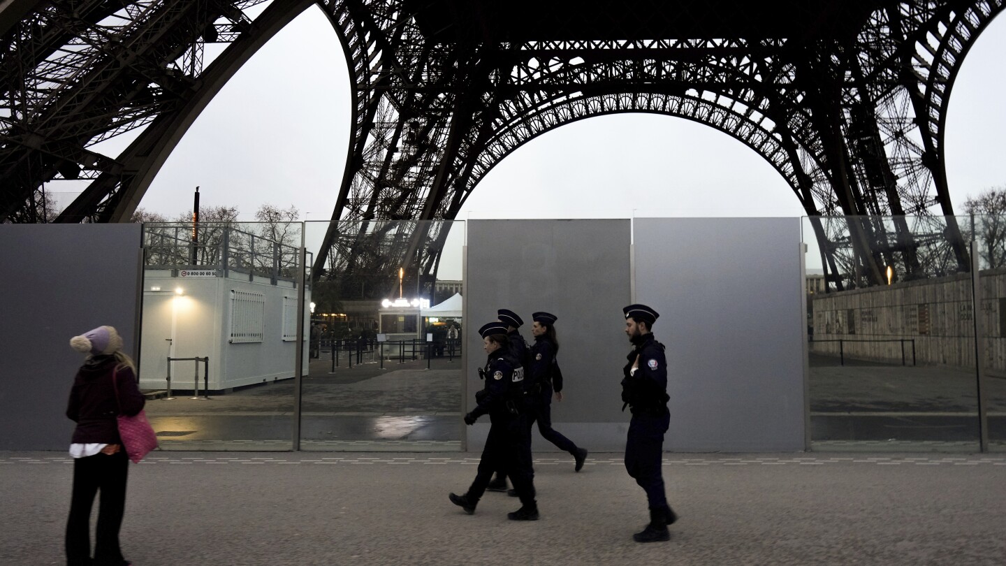 French police address fear factor ahead of the Olympic Games after a deadly attack near Eiffel Tower | AP News