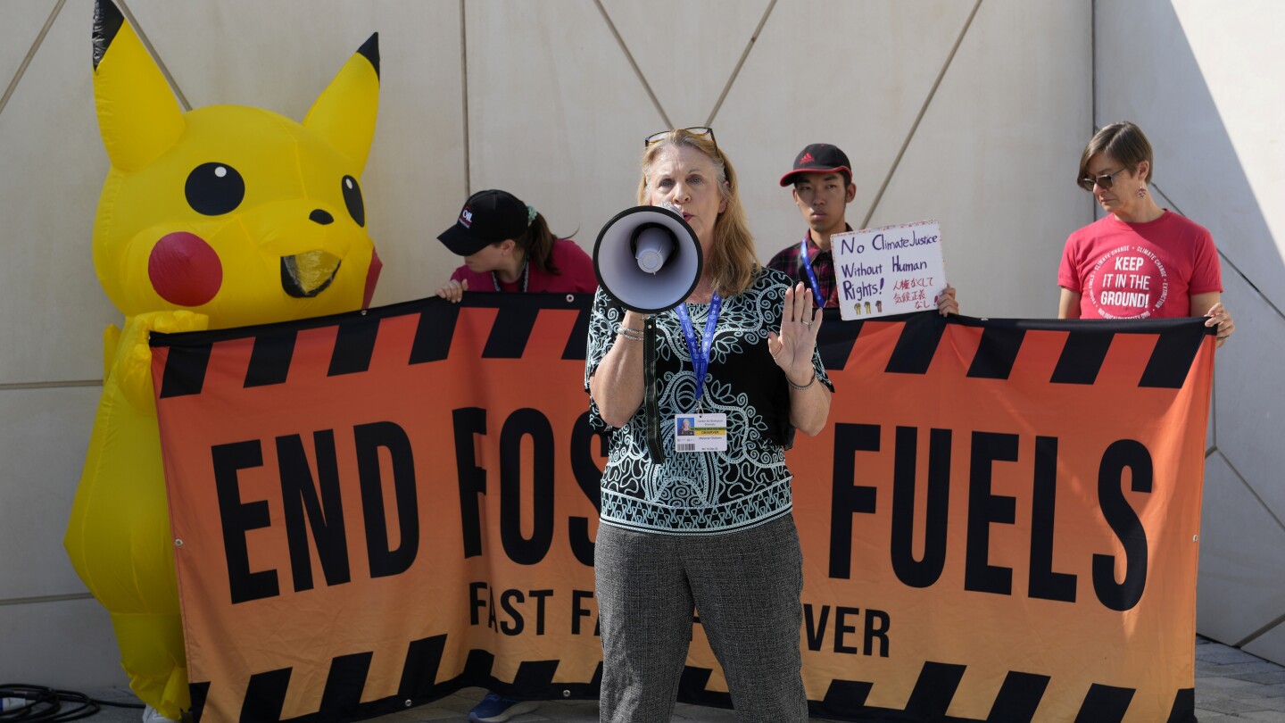 At COP28, sticking points remain on fossil fuels and adapting to climate as talks near crunch time | AP News