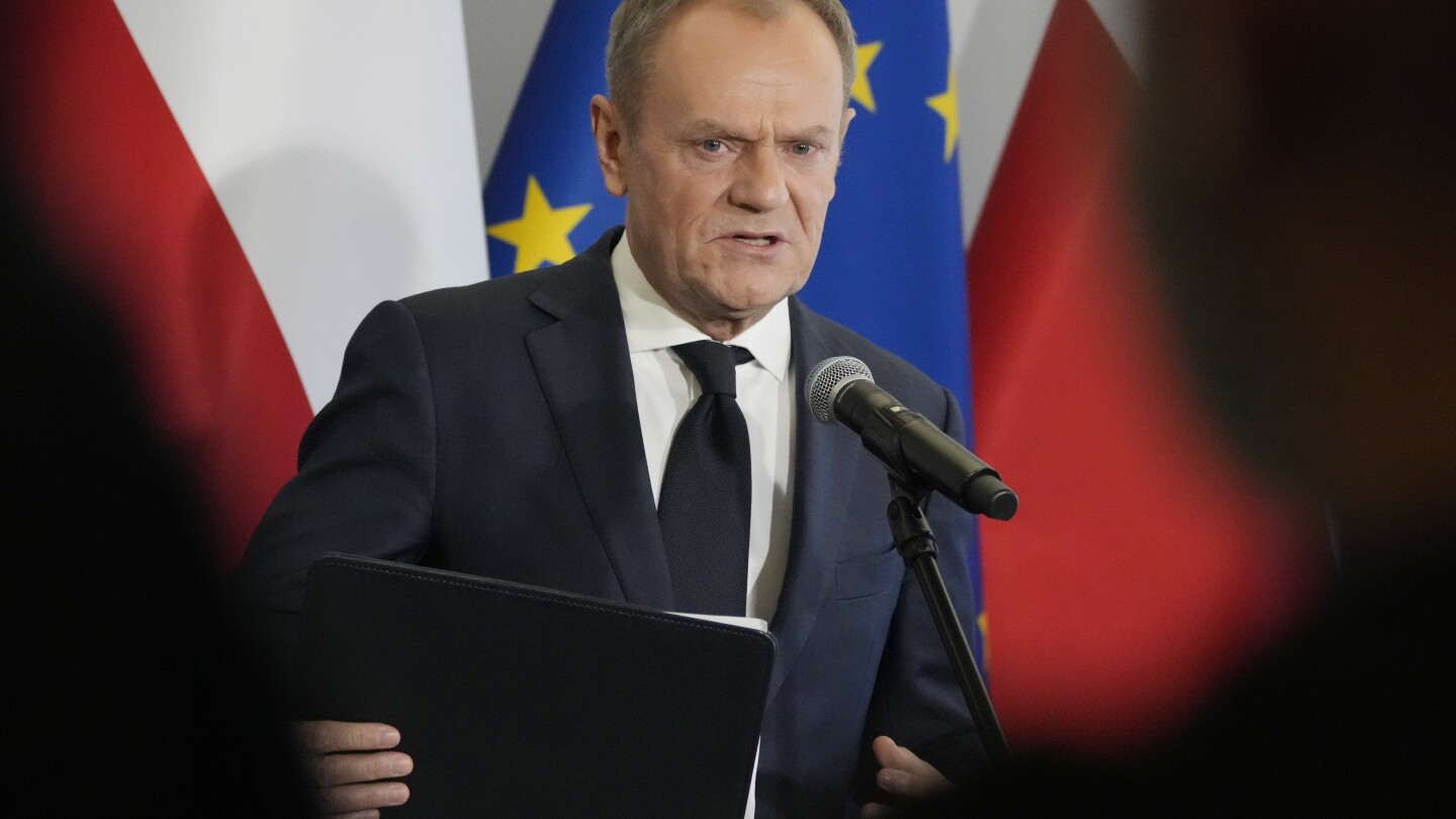 A day of 2 prime ministers in Poland begins the delayed transition to a centrist, pro-EU government | AP News