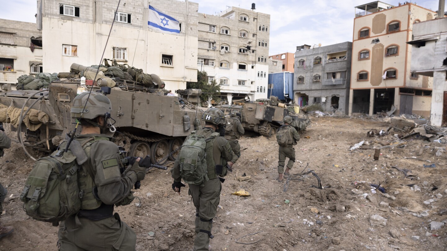 Israel-Hamas war: Israel battles militants in Gaza’s main cities | AP News