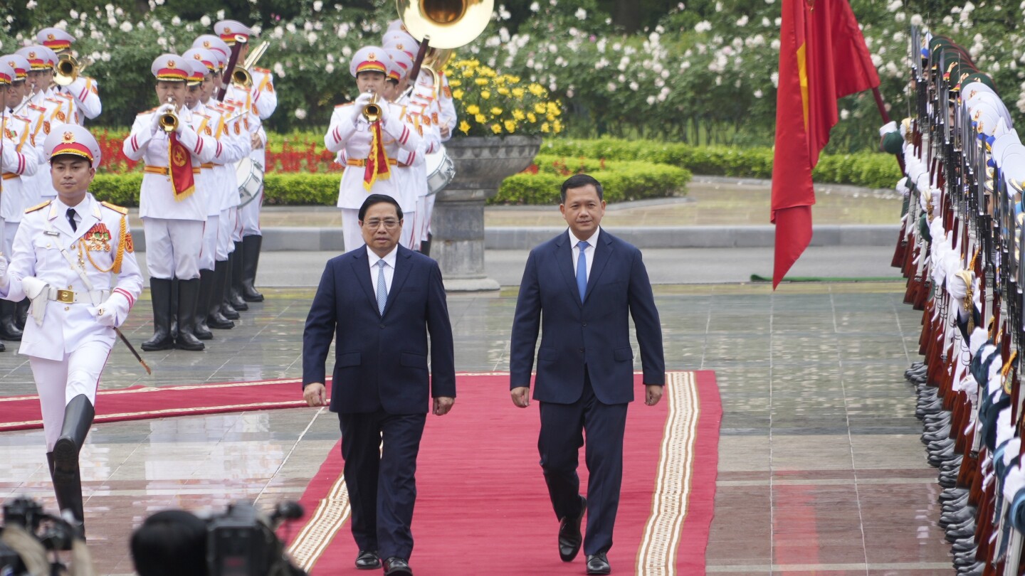 Cambodia’s leader holds talks in neighboring Vietnam on first visit since becoming prime minister | AP News