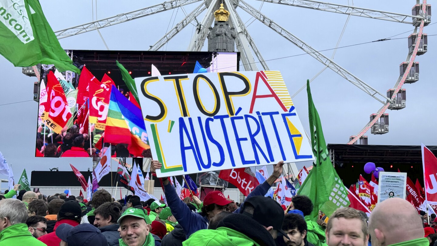 Thousands of protesters rally in Brussels for better wages and public services | AP News