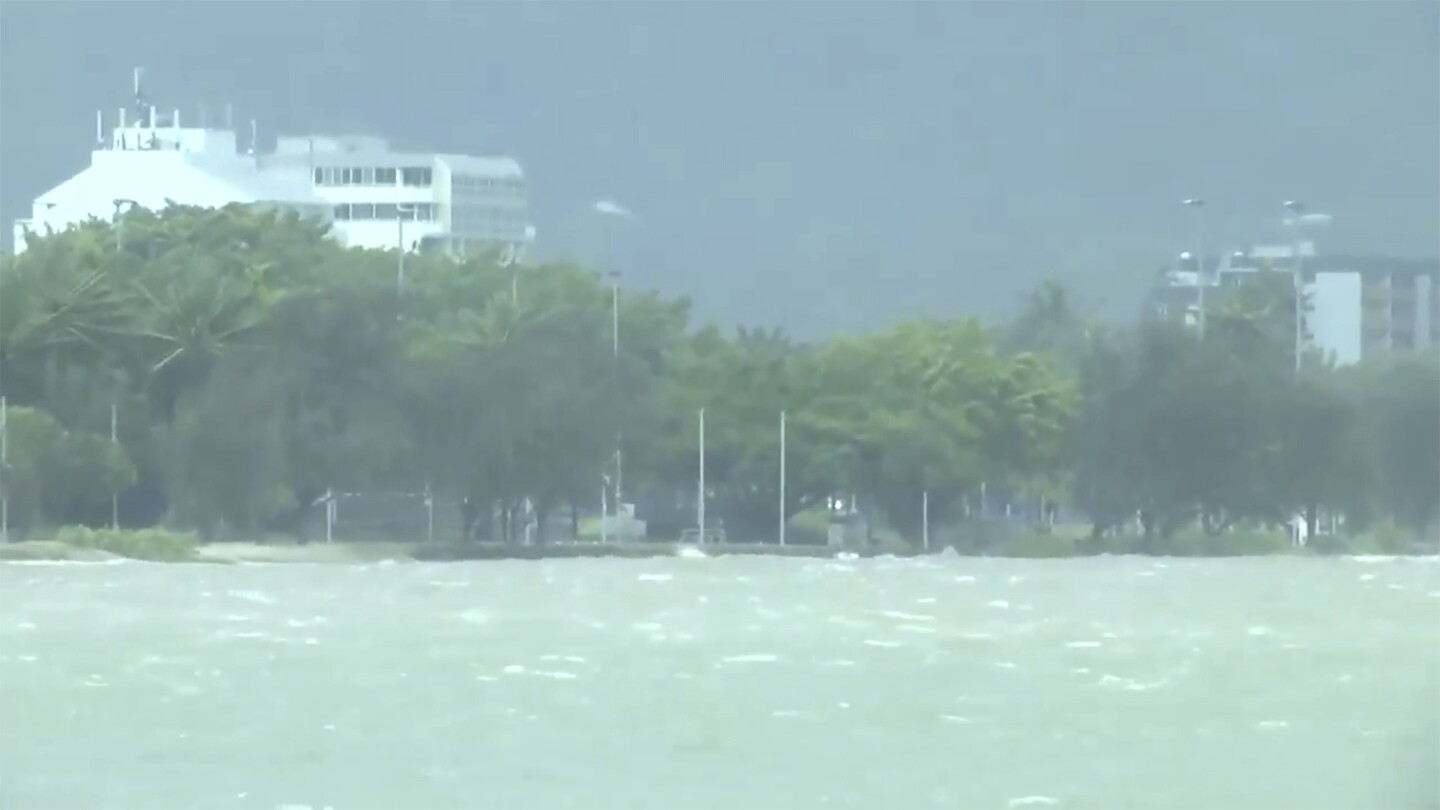 Cyclone Jasper crosses Australia’s east coast as category 2 storm with 87 mph winds | AP News