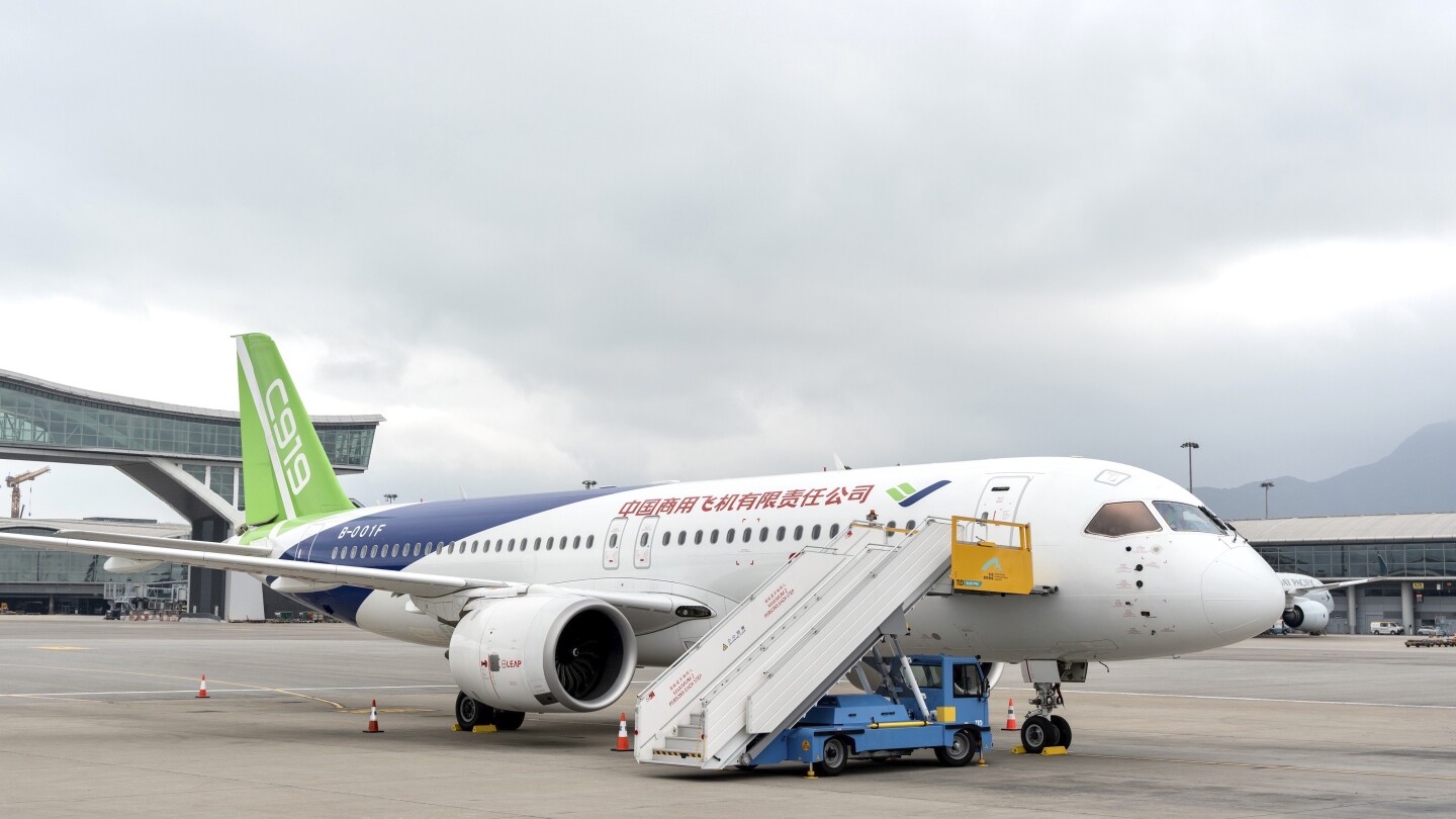 China-made C919, ARJ21 passenger jets on display in Hong Kong | AP News