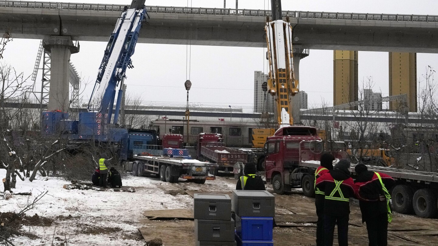 515 injured in a Beijing rail collision as heavy snow hits the Chinese capital | AP News