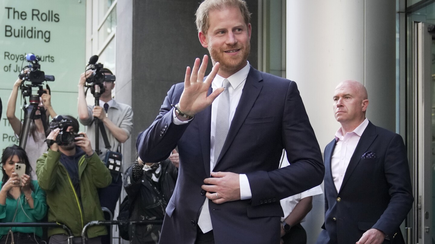 Prince Harry wins phone hacking lawsuit against Mirror Group Newspapers | AP News