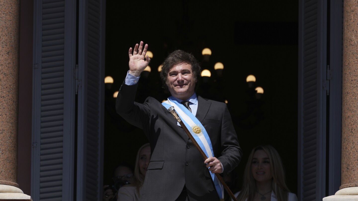 Argentine President Javier Milei raffles off his last salary as lawmaker | AP News