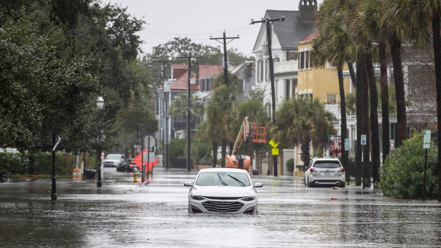 Storm drenches Florida and causes floods in South Carolina as it moves up East Coast | AP News