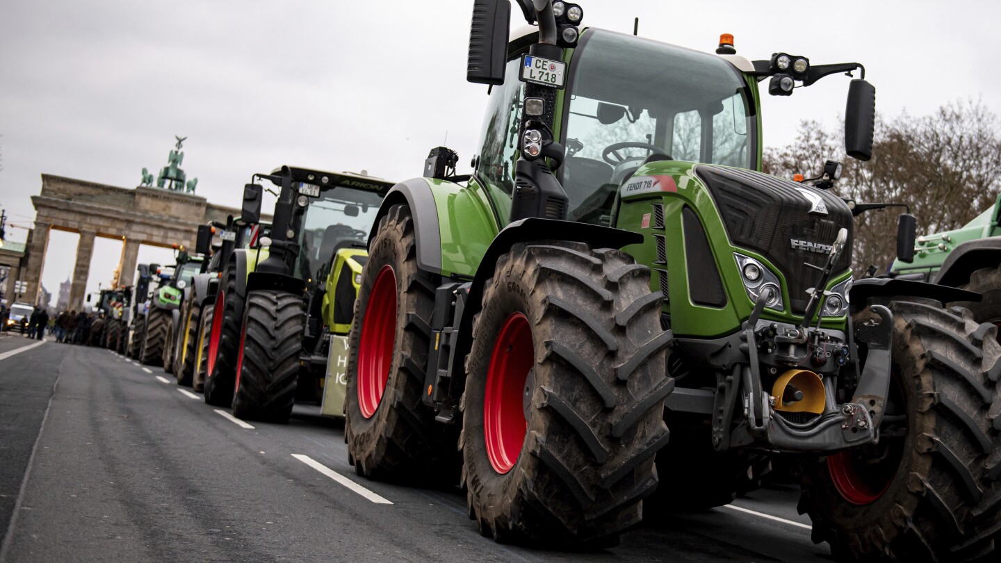 Farmers protest against a German government plan to cut tax breaks for diesel | AP News