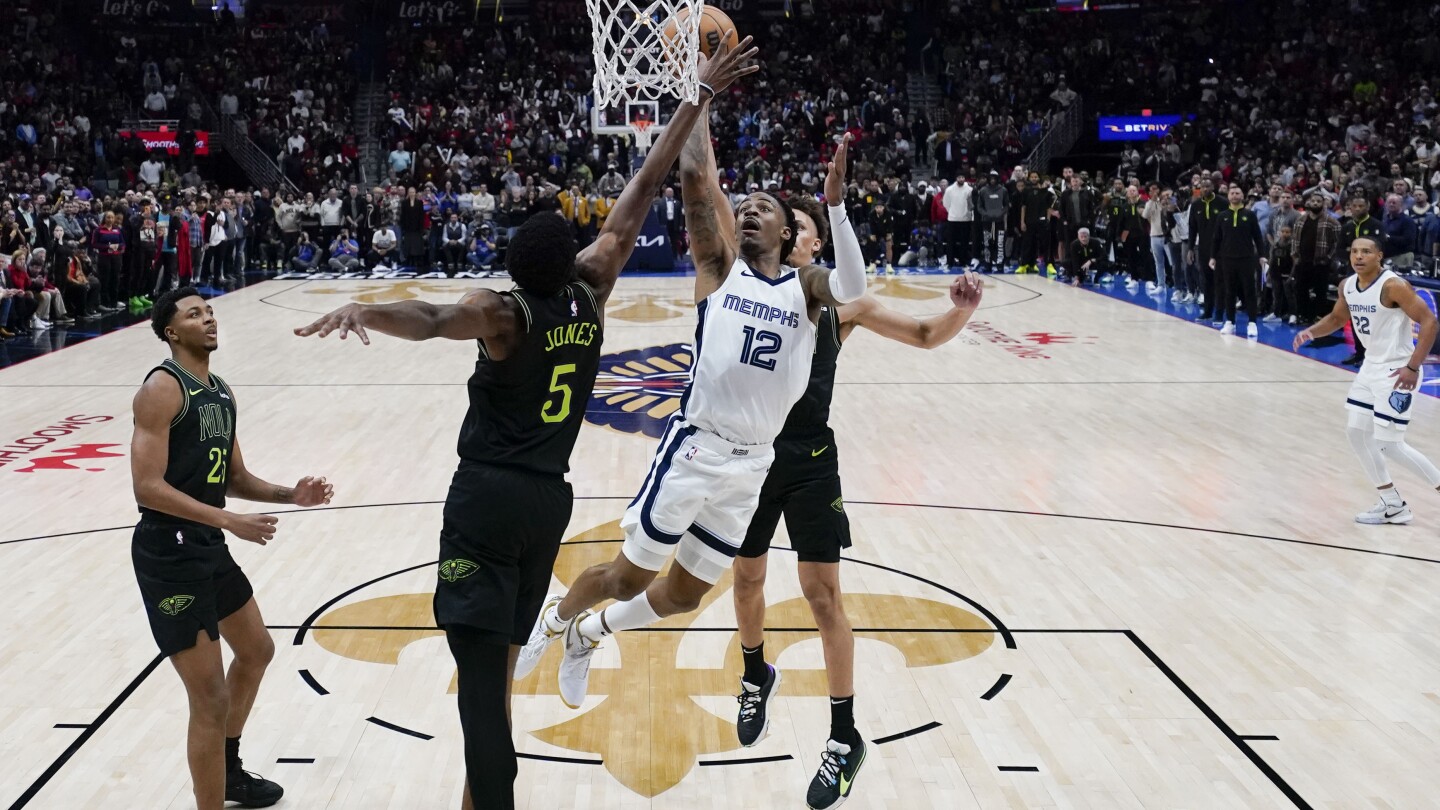 Morant’s 34 points in stirring season debut lead Grizzlies to 115-113 win over Pelicans | AP News