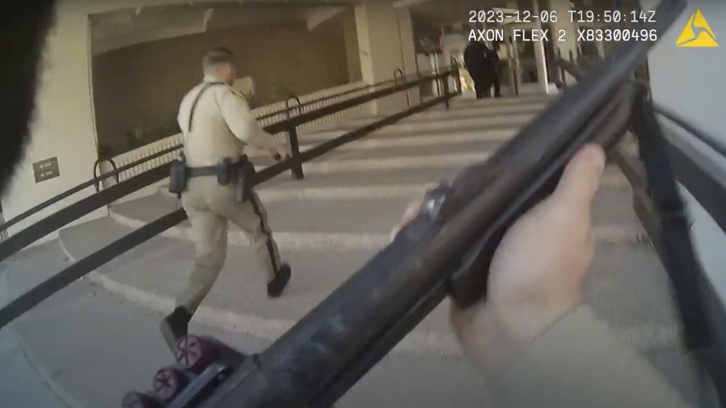 Newly released video shows how police moved through UNLV campus in response to reports of shooting | AP News